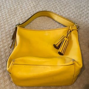 Yellow Coach bag.